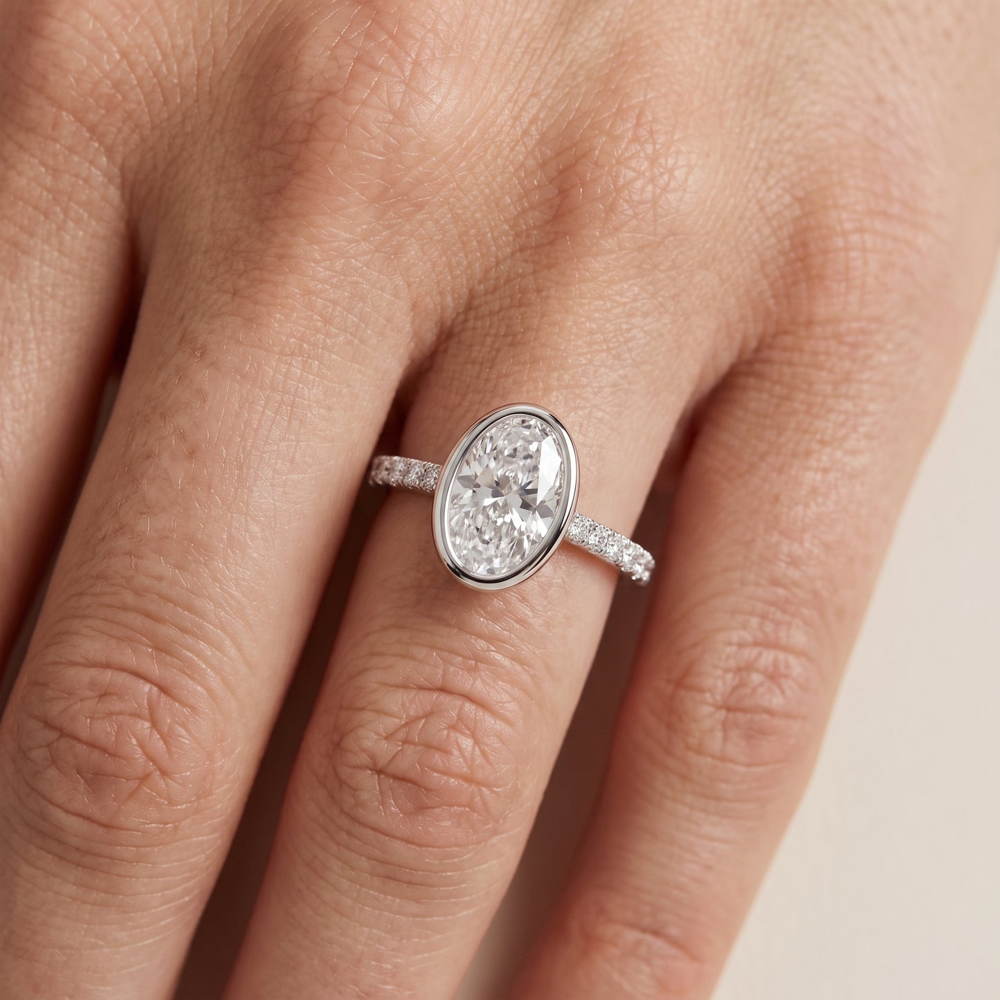 Cora Bezel Pavé Oval Diamond Ring in White Gold - lifestyle.jpg