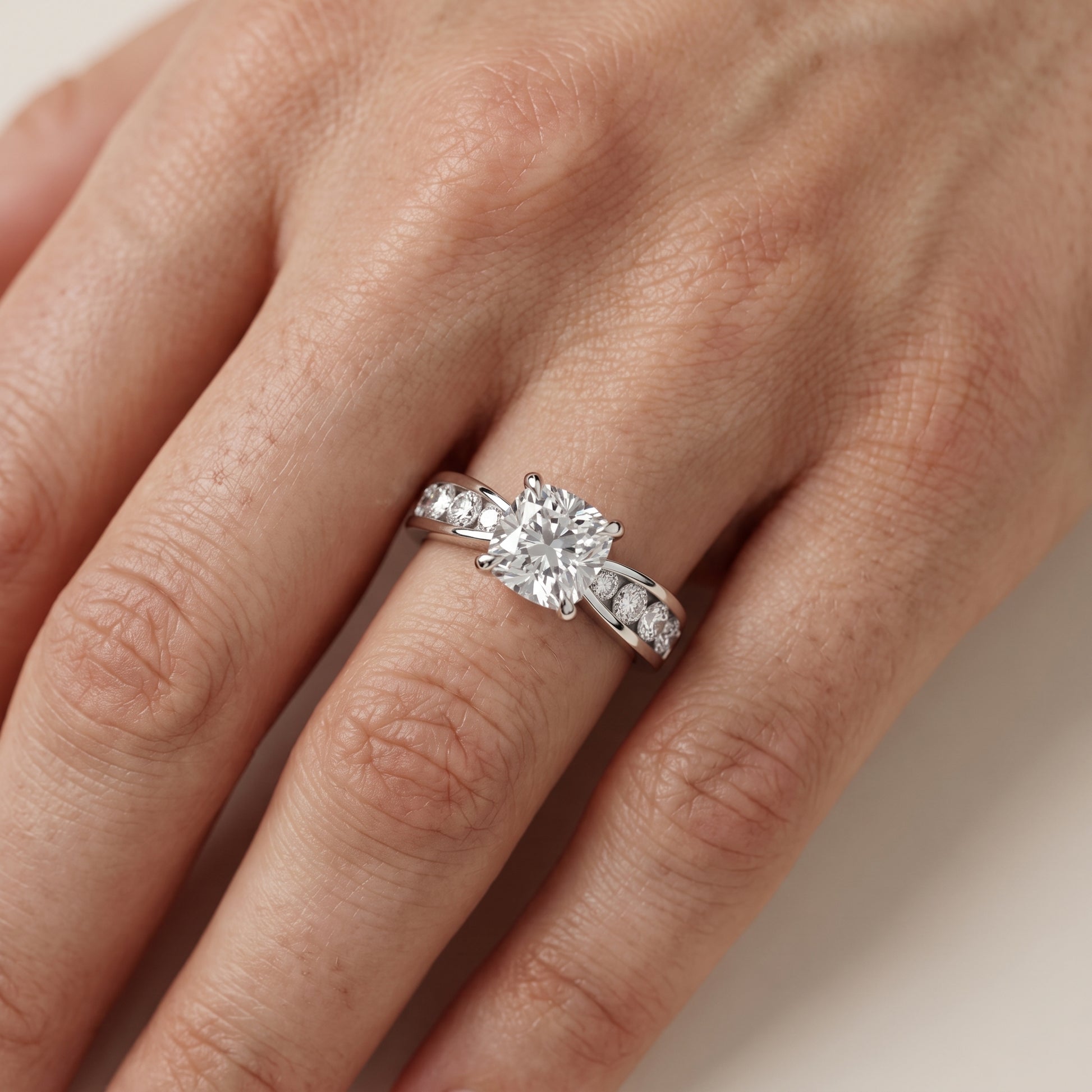 Noor Channel Set Sidestone Cushion Diamond Engagement Ring in White Gold - lifestyle.jpg