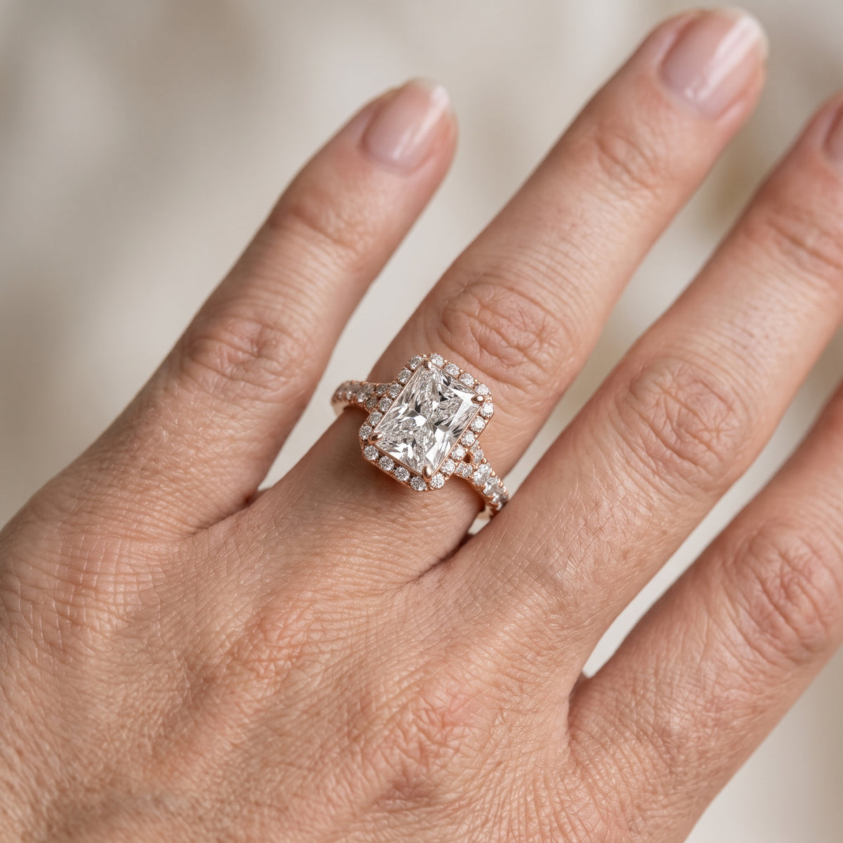Bella Halo Pavé Radiant Diamond Engagement Ring in Rose Gold - lifestyle.jpg