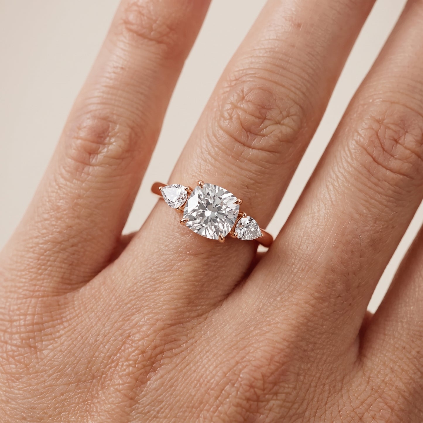 Phoebe Three-Stone Cushion Diamond Ring in Rose Gold - lifestyle.jpg