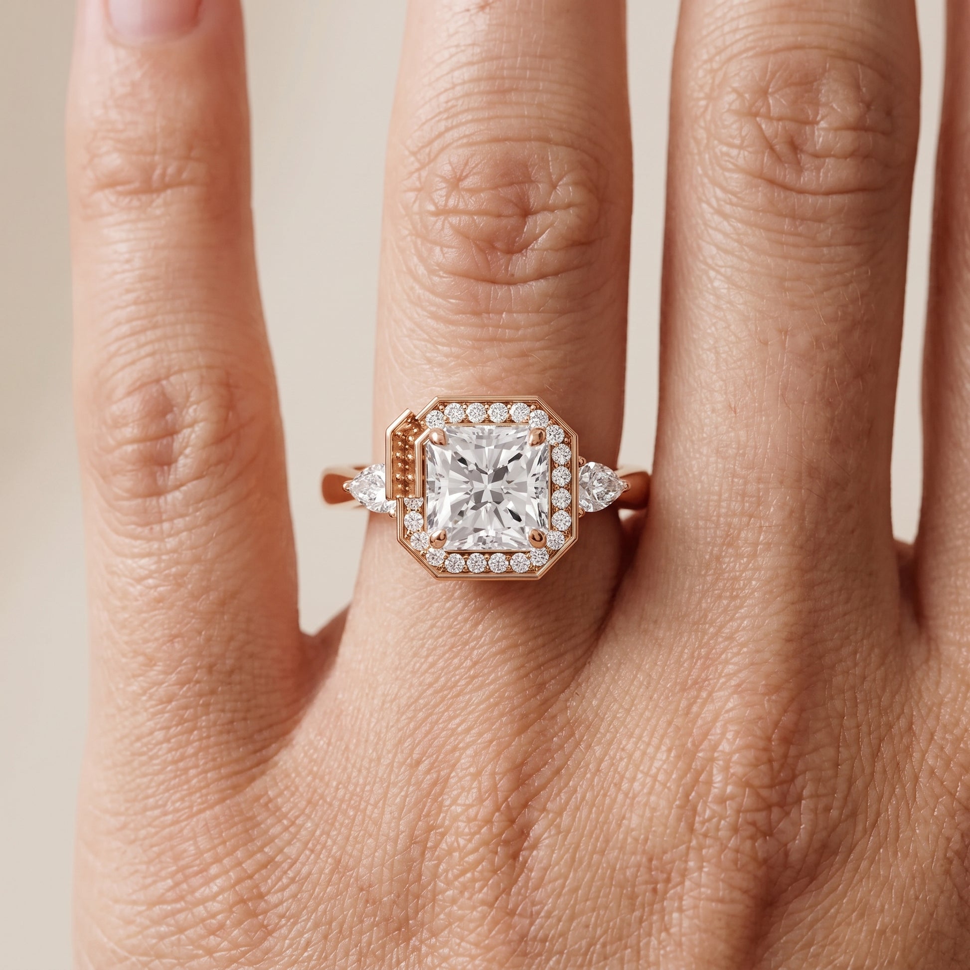 Eliza Halo Sidestone Radiant Diamond Engagement Ring in Rose Gold - lifestyle.jpg