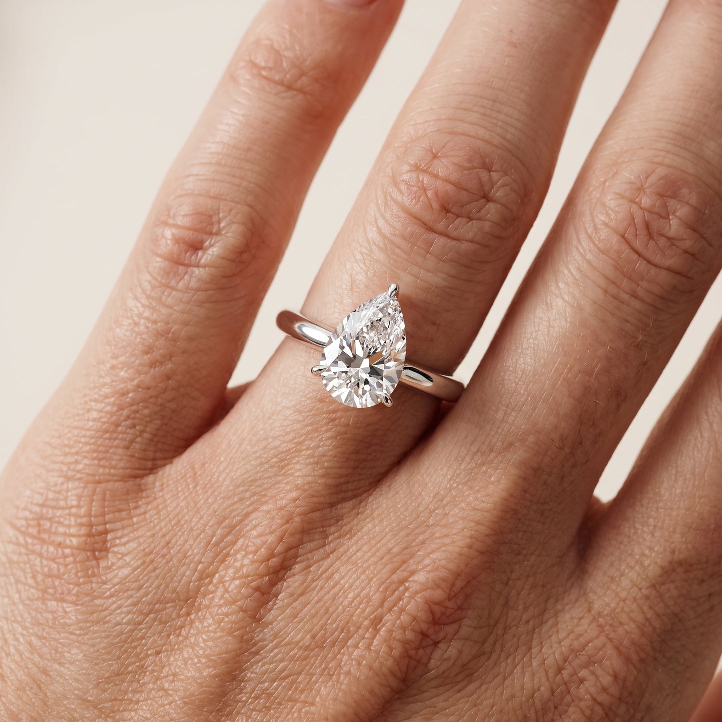 Kalia Knife Edge Solitaire Pear Diamond Engagement Ring in White Gold - lifestyle.jpg