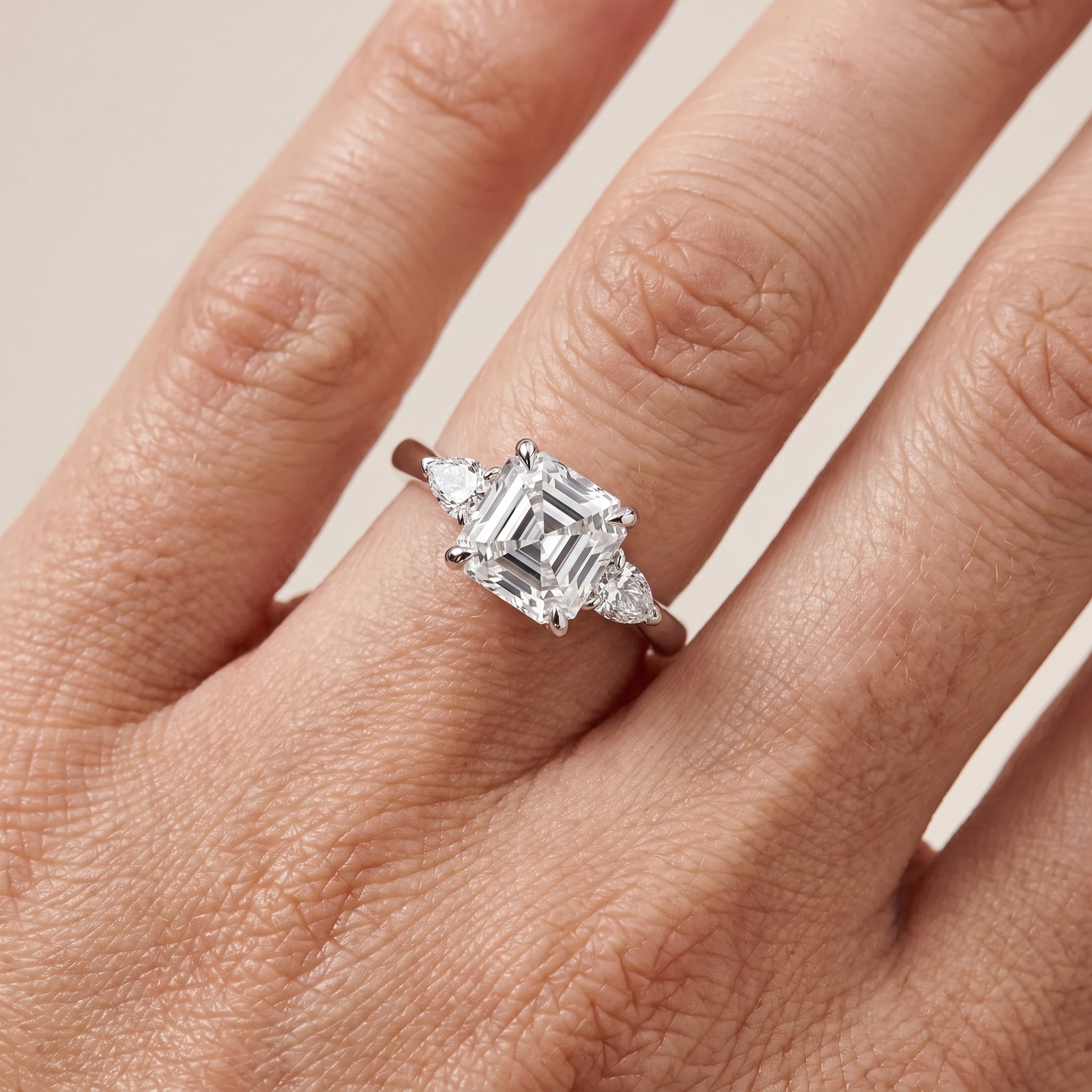 Leila Three-Stone Asscher Diamond Engagement Ring in Platinum - lifestyle.jpg
