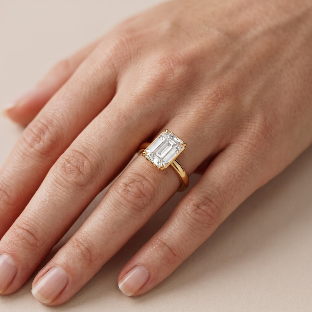 Ashland Basket Solitaire Emerald Diamond Engagement Ring in Silver - lifestyle.jpg