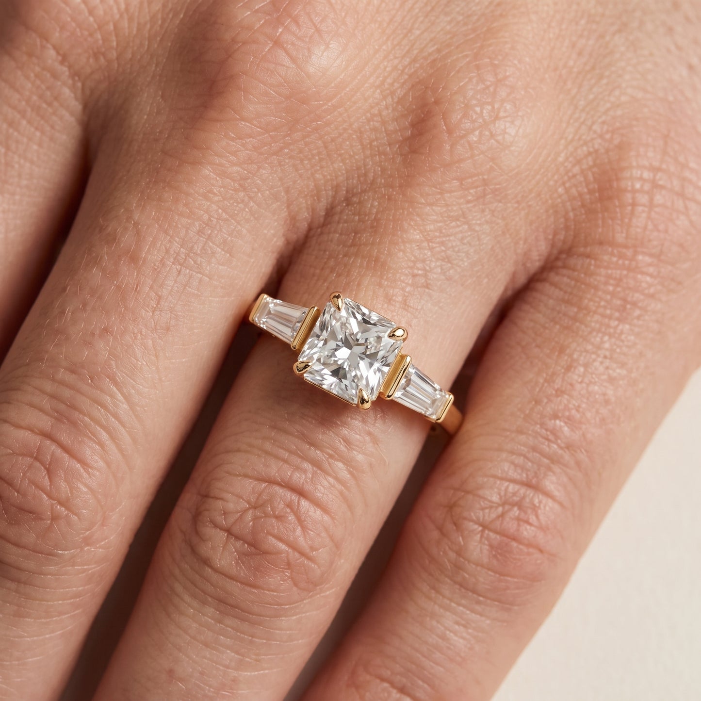 Layla Tapered Baguette Radiant Diamond Ring in Yellow Gold - lifestyle.jpg