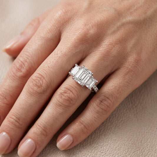 Gabrielle Three-Stone Pavé Emerald Diamond Engagement Ring in Platinum - lifestyle.jpg