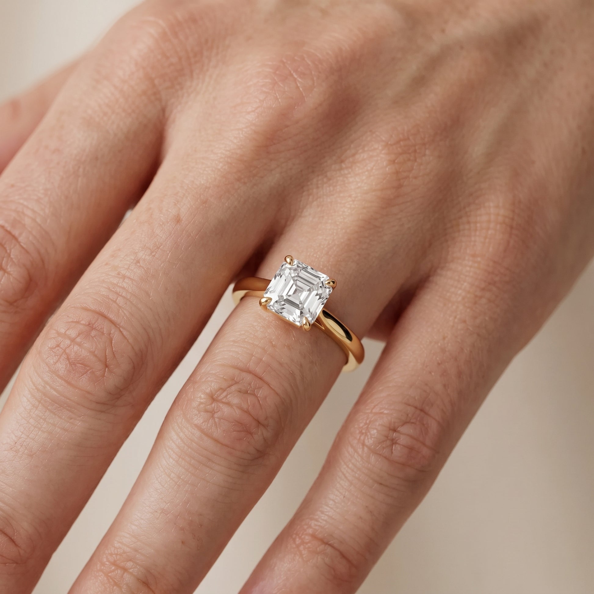 Kalia Knife Edge Solitaire Asscher Diamond Engagement Ring in Yellow Gold - lifestyle.jpg