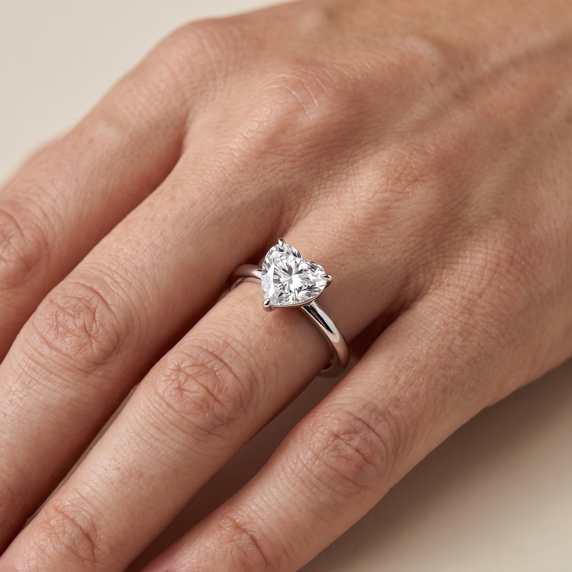 Lyla Petite Solitaire Heart Diamond Engagement Ring in Silver - lifestyle.jpg