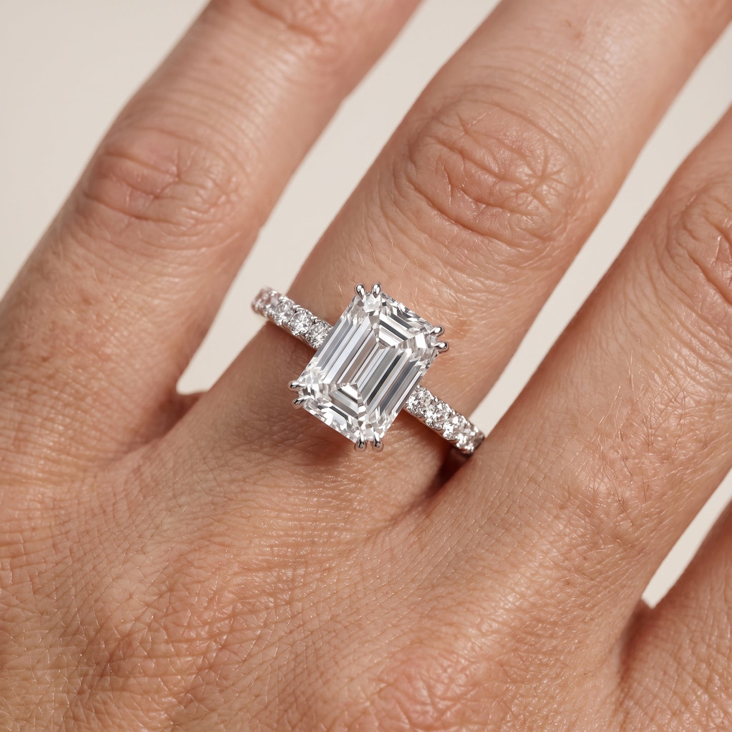 Novara Solitaire Pavé Emerald Diamond Ring in Silver - lifestyle.jpg