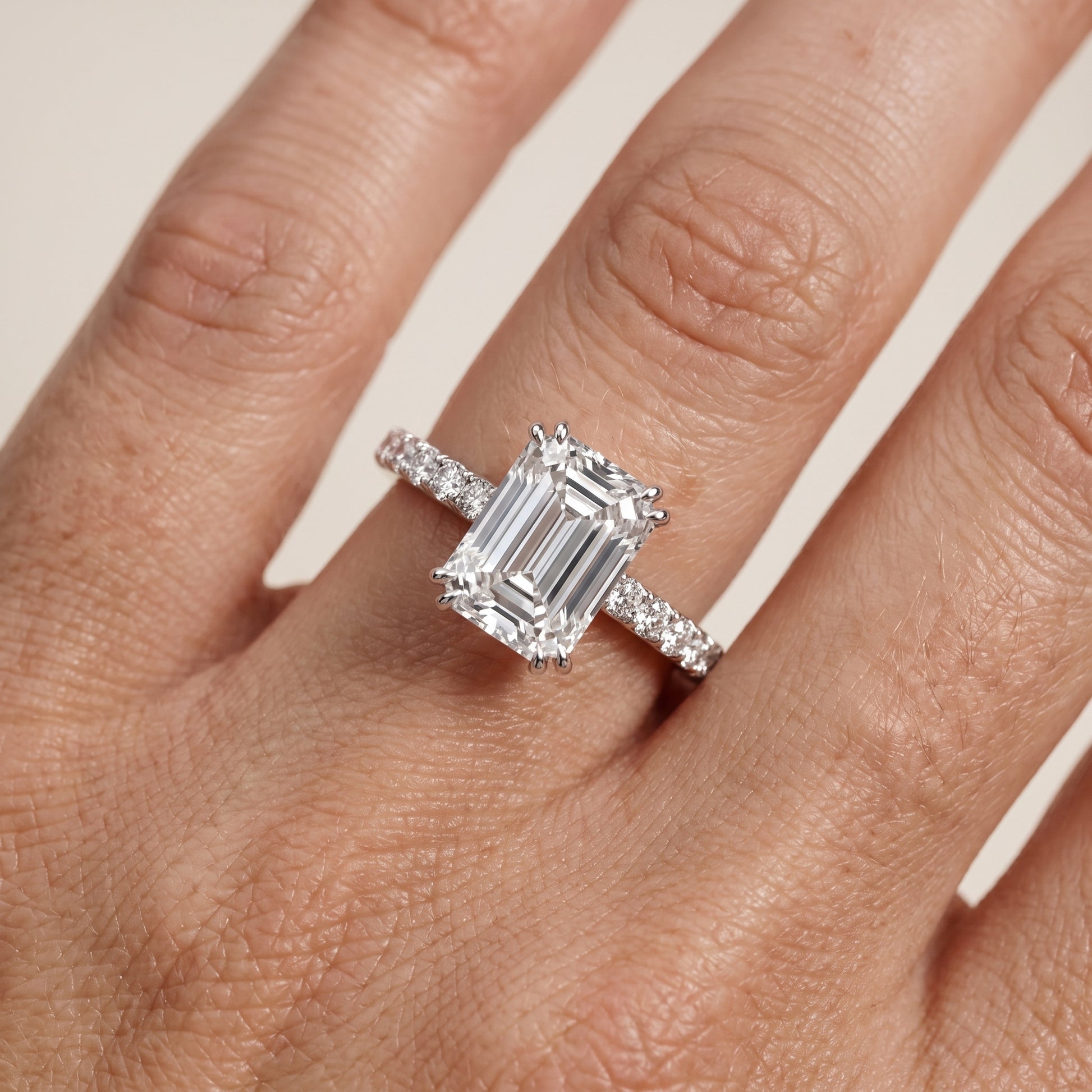 Novara Solitaire Pavé Emerald Diamond Ring in Silver - lifestyle.jpg
