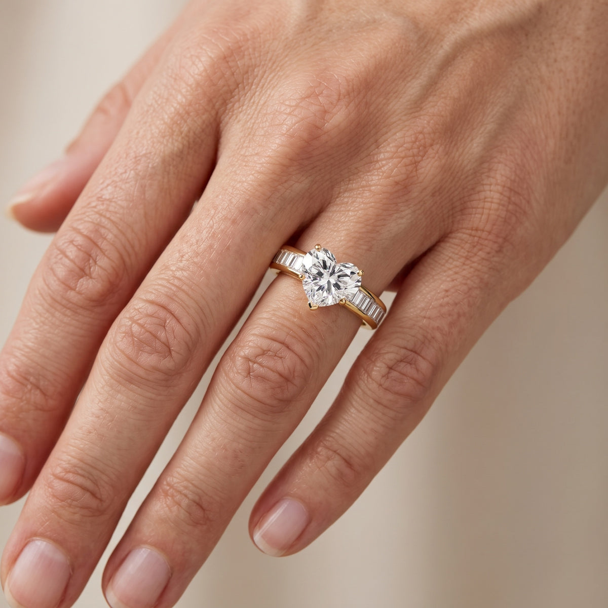 Medina Baguette Channel Set Heart Diamond Engagement Ring in Yellow Gold - lifestyle.jpg