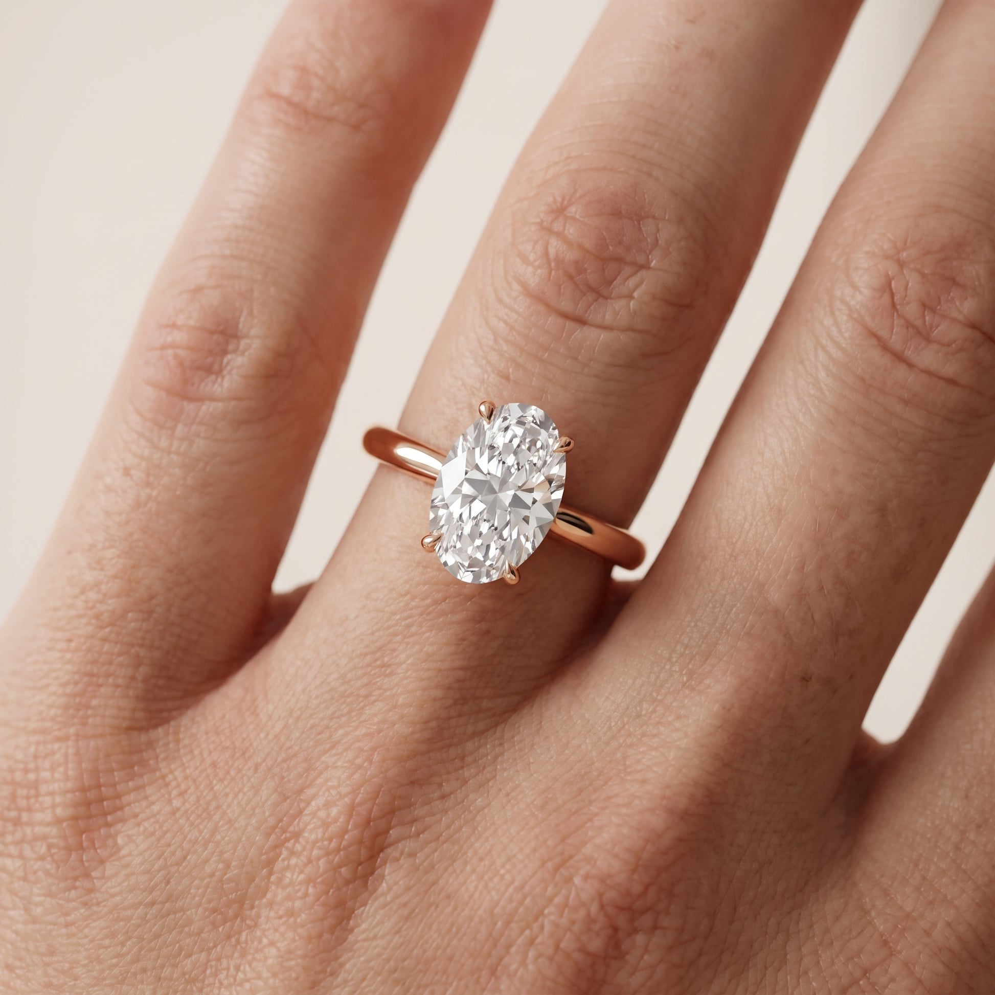 Kalia Knife Edge Solitaire Oval Diamond Engagement Ring in Rose Gold - lifestyle.jpg
