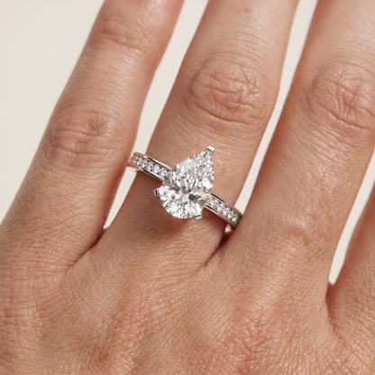 Tessa Solitaire Channel Set Pear Diamond Engagement Ring in Platinum - lifestyle.jpg