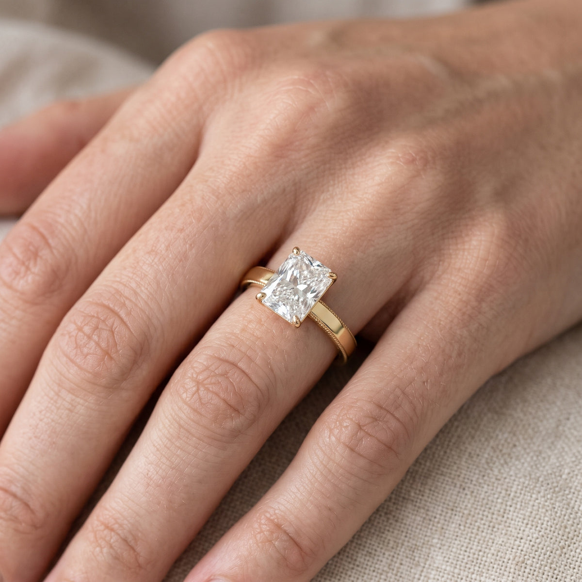 Kerry Engraved Solitaire Radiant Diamond Engagement Ring in Silver - lifestyle.jpg