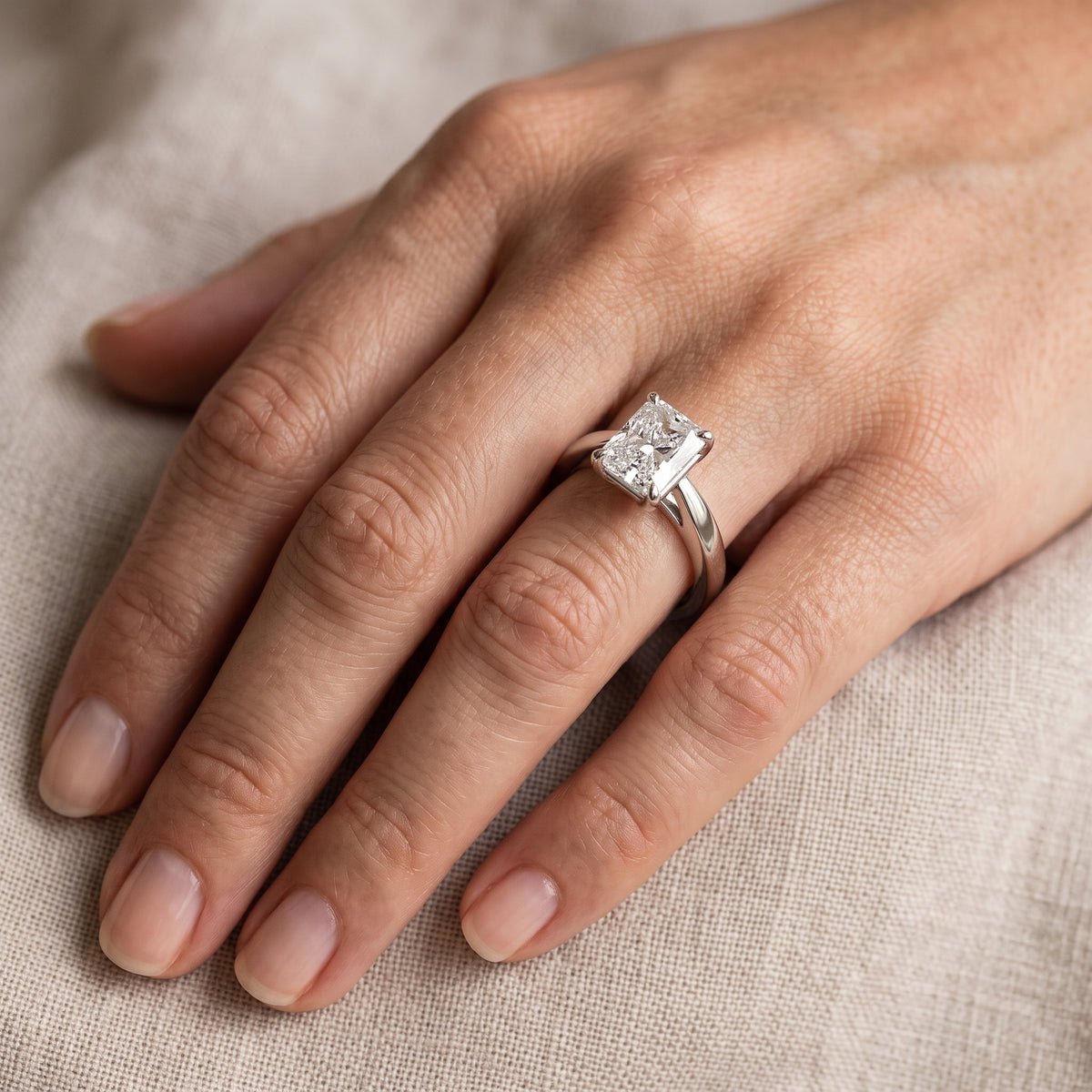 Lucia Solitaire Six-Prong Radiant Diamond Engagement Ring in Silver - lifestyle.jpg
