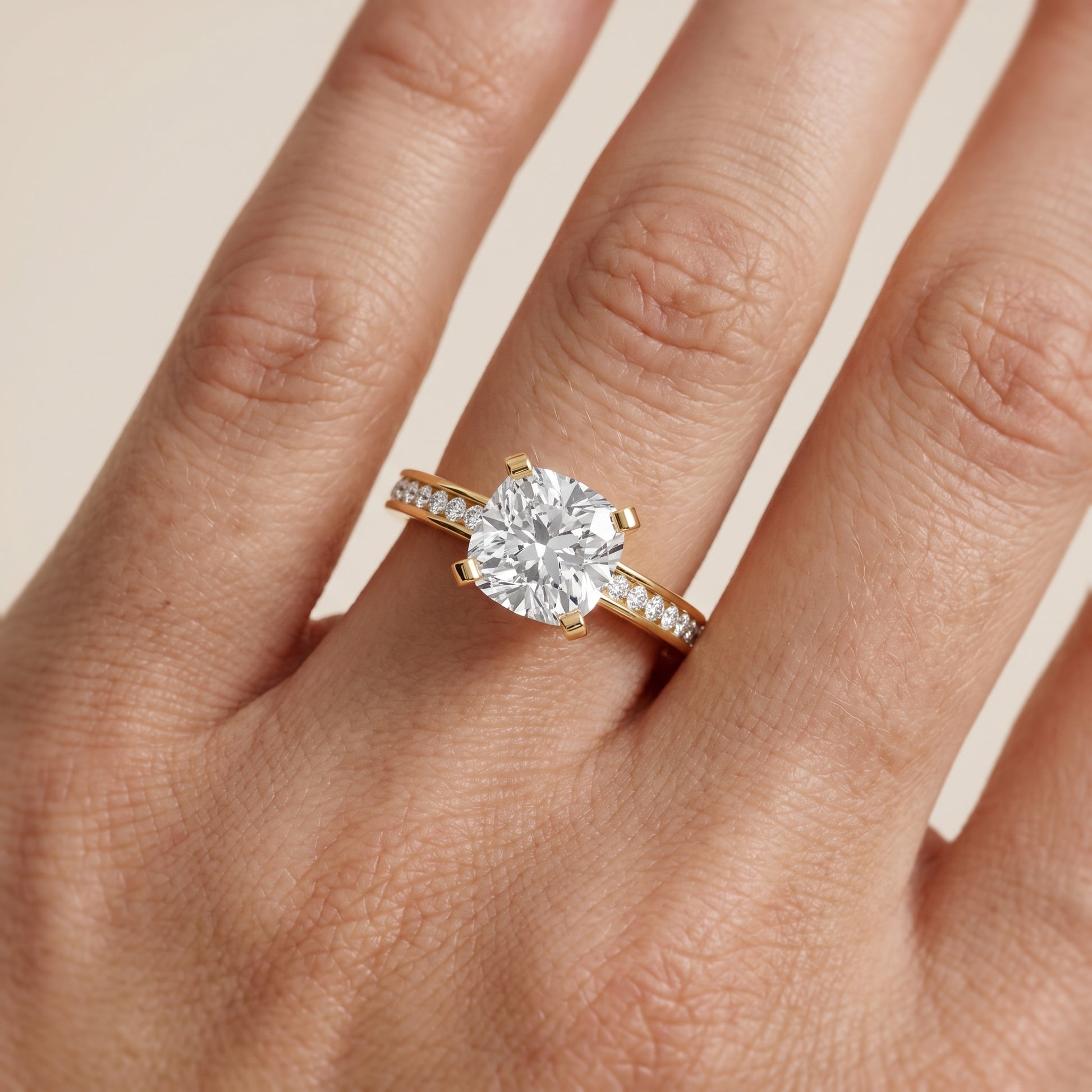 Tessa Solitaire Channel Set Cushion Diamond Engagement Ring in Yellow Gold - lifestyle.jpg