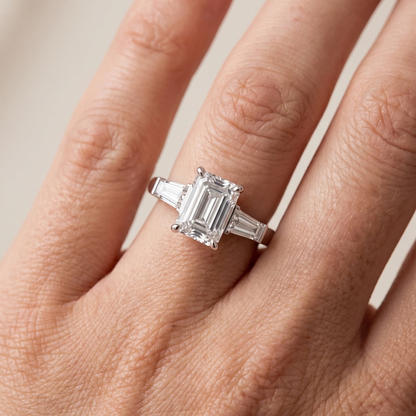 Zelda Tapered Baguette Emerald Diamond Engagement Ring in Silver - lifestyle.jpg