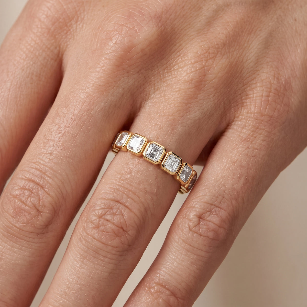 Scarlett Bezel Asscher Diamond Half Eternity Band in Yellow Gold - lifestyle.jpg
