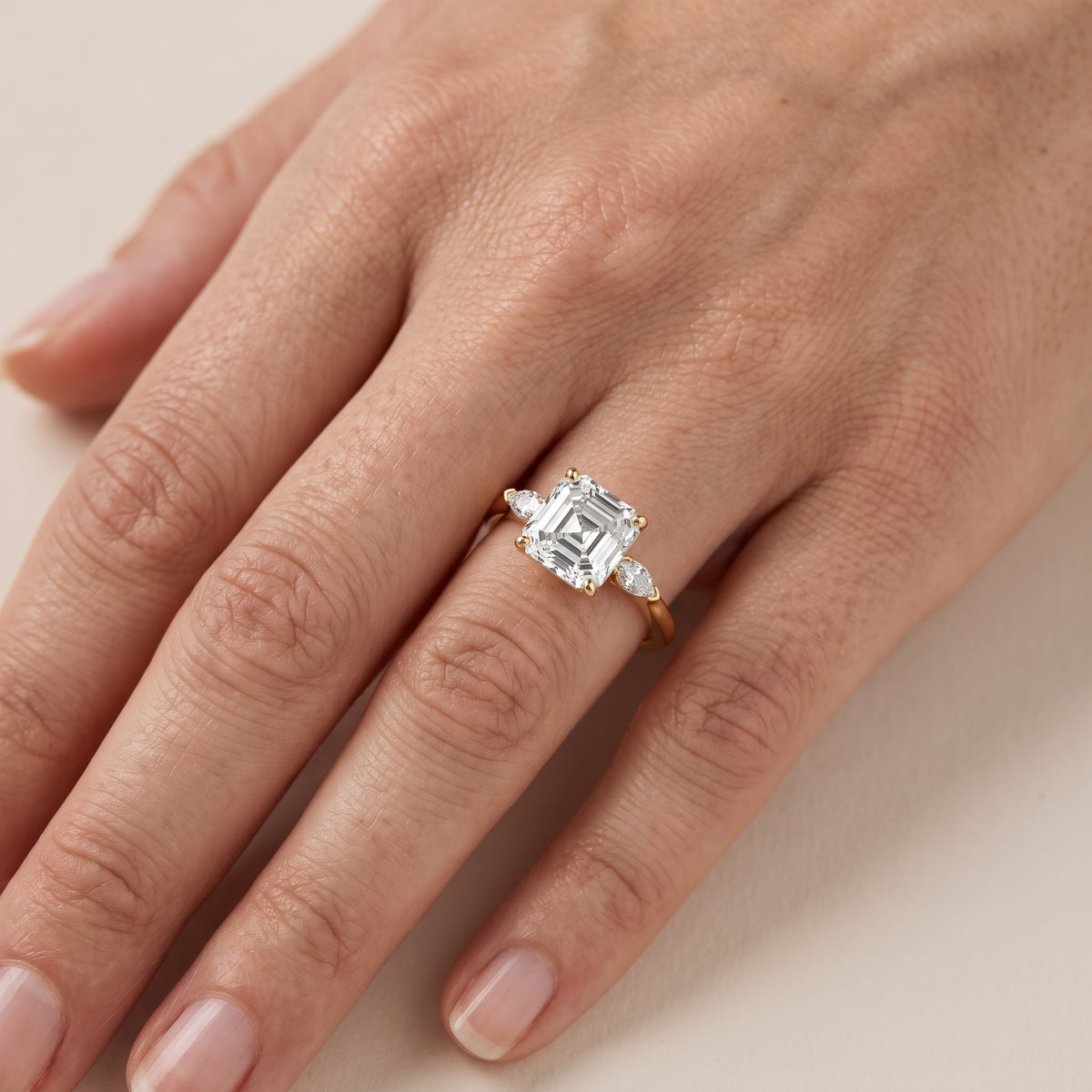 Lissa Marquise-Side Three-Stone Asscher Diamond Engagement Ring in Platinum - lifestyle.jpg