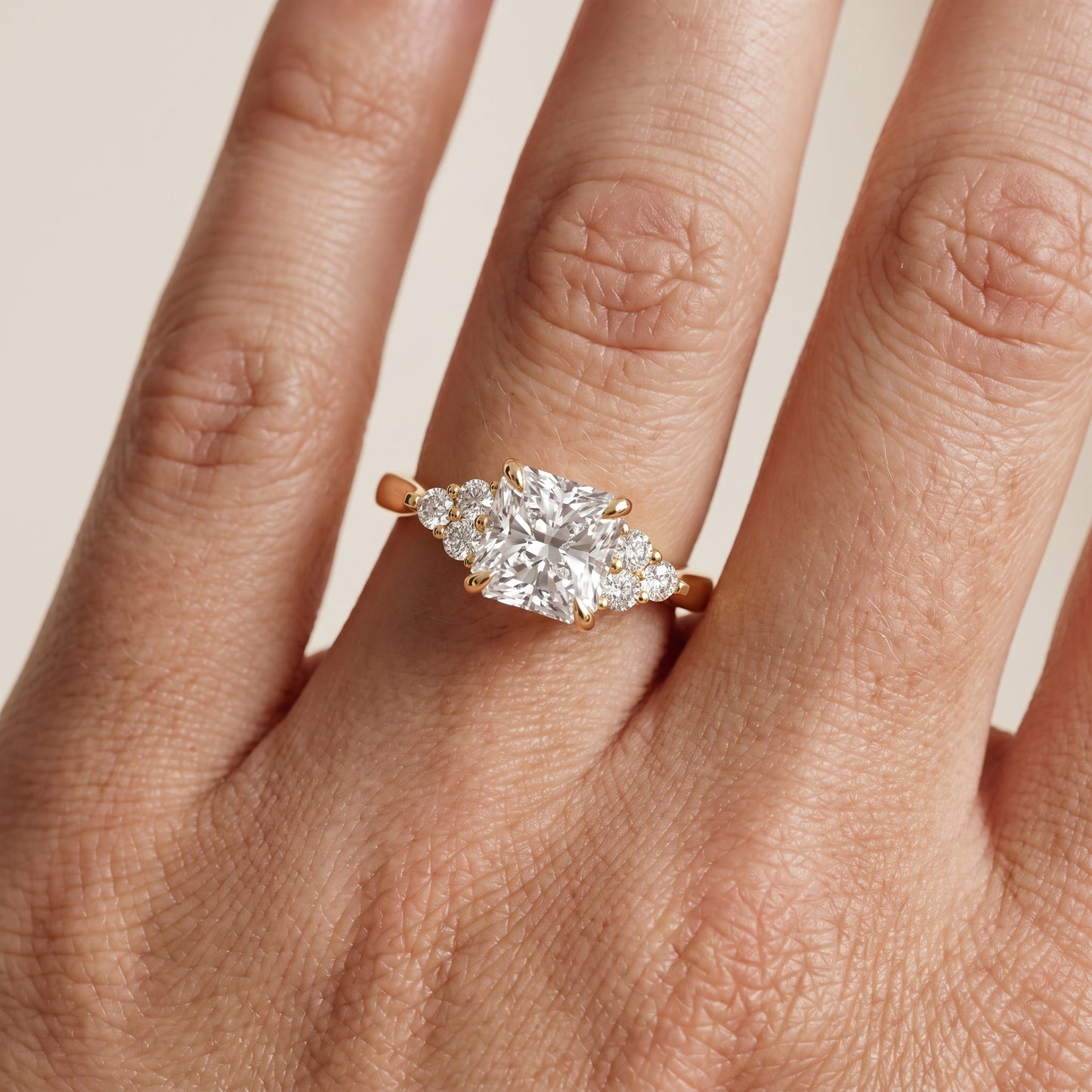 Anya Sidestone Cluster Radiant Diamond Ring in Yellow Gold - lifestyle.jpg