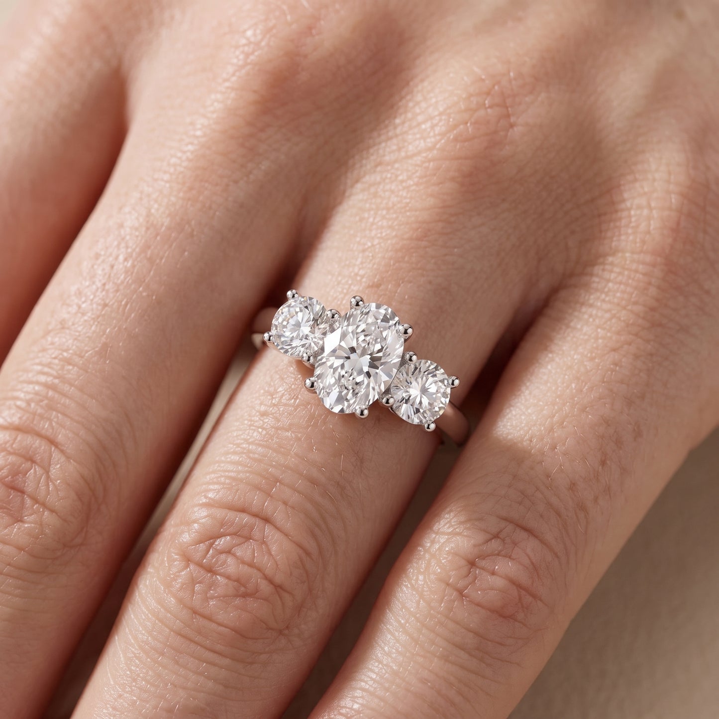 Callie Three-Stone Trellis Oval Diamond Engagement Ring in Platinum - lifestyle.jpg