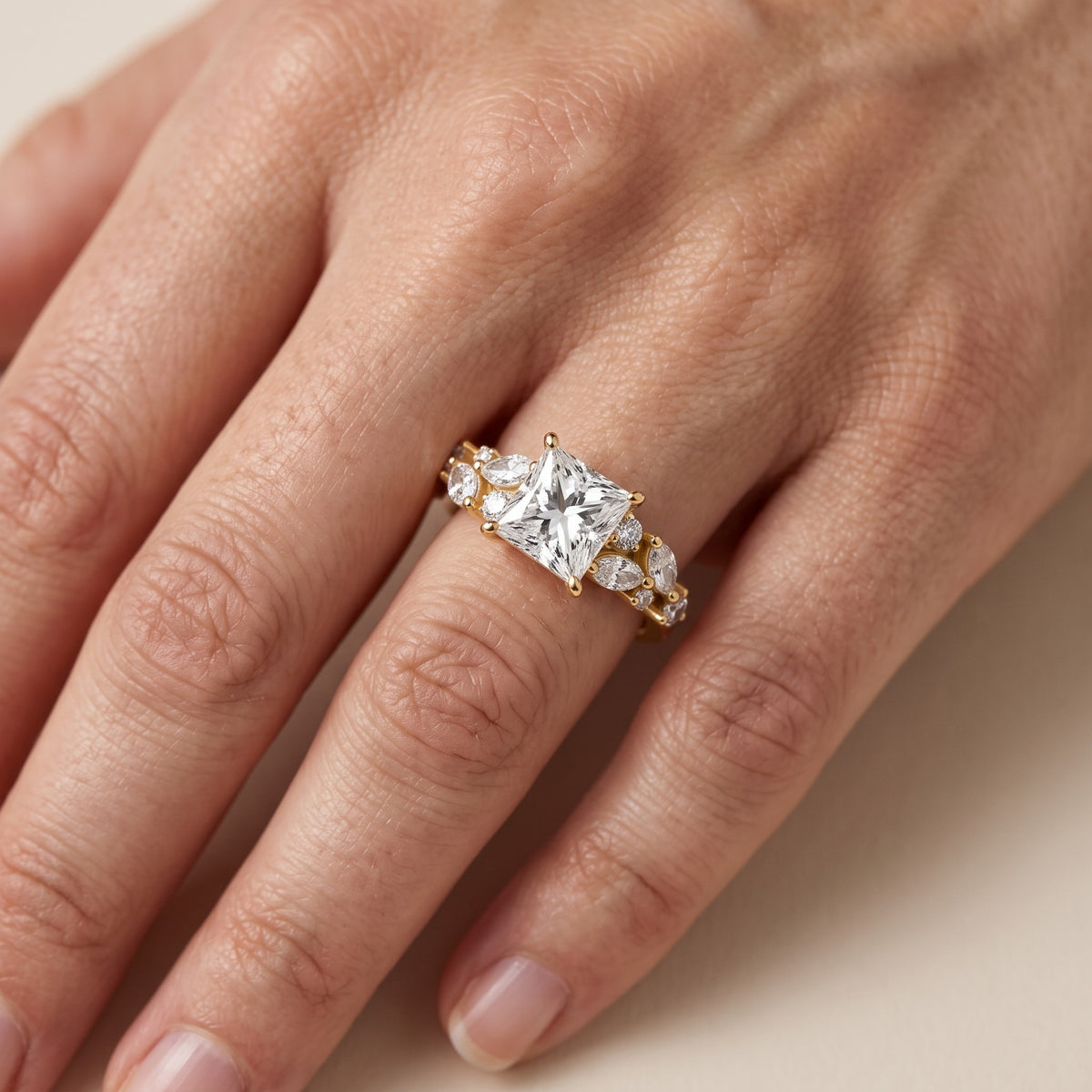Kelsey Leaf Cluster Princess Diamond Engagement Ring in Yellow Gold - lifestyle.jpg