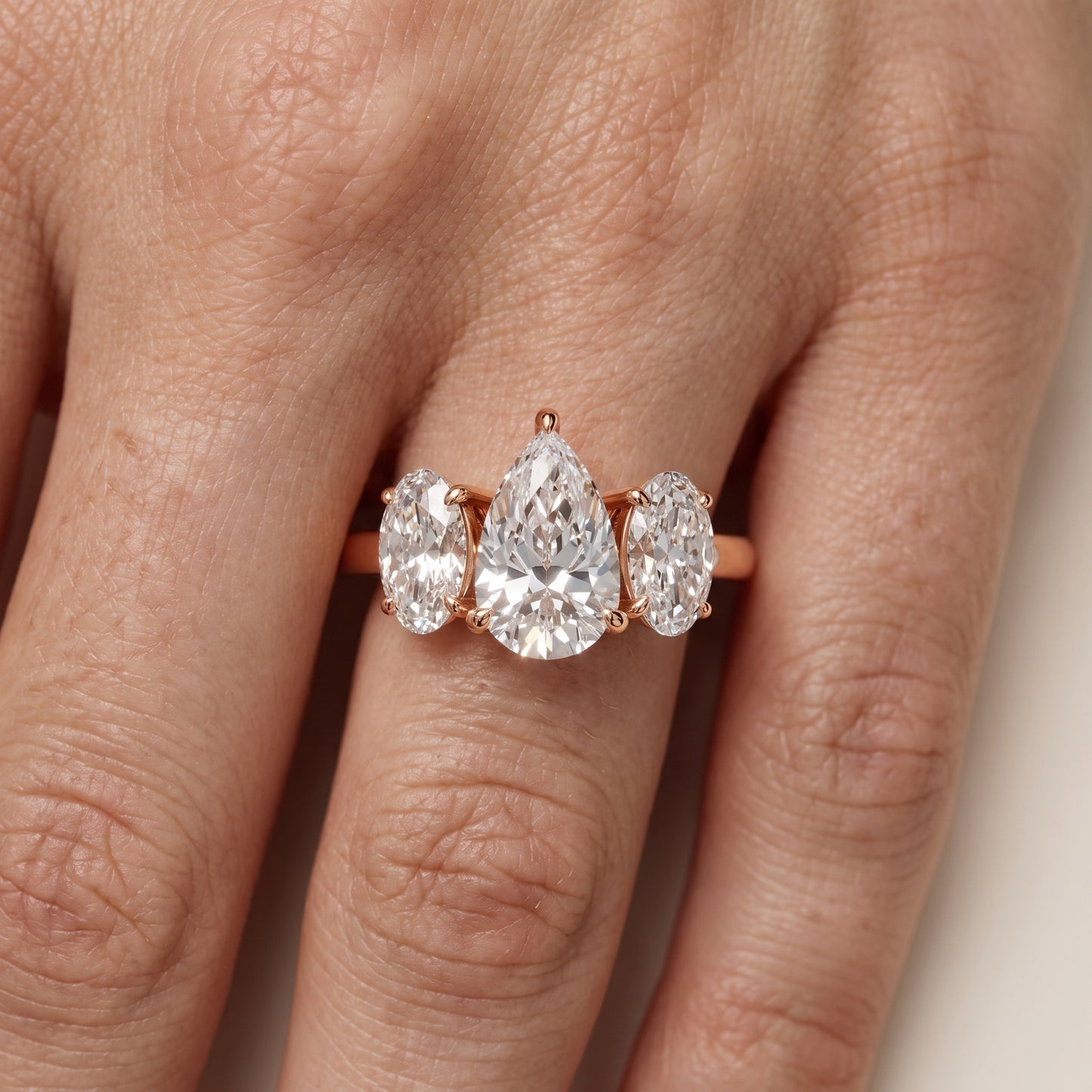 Lila Three-Stone Pear Diamond Ring in Rose Gold - lifestyle.jpg
