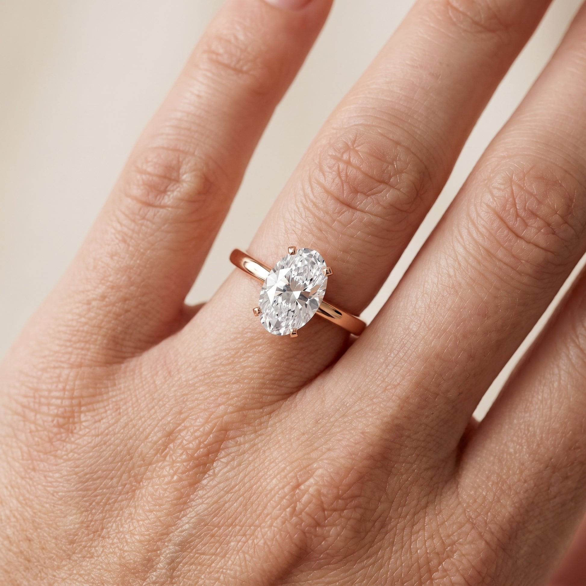 Liana Solitaire Claw Prong Oval Diamond Engagement Ring in Rose Gold - lifestyle.jpg