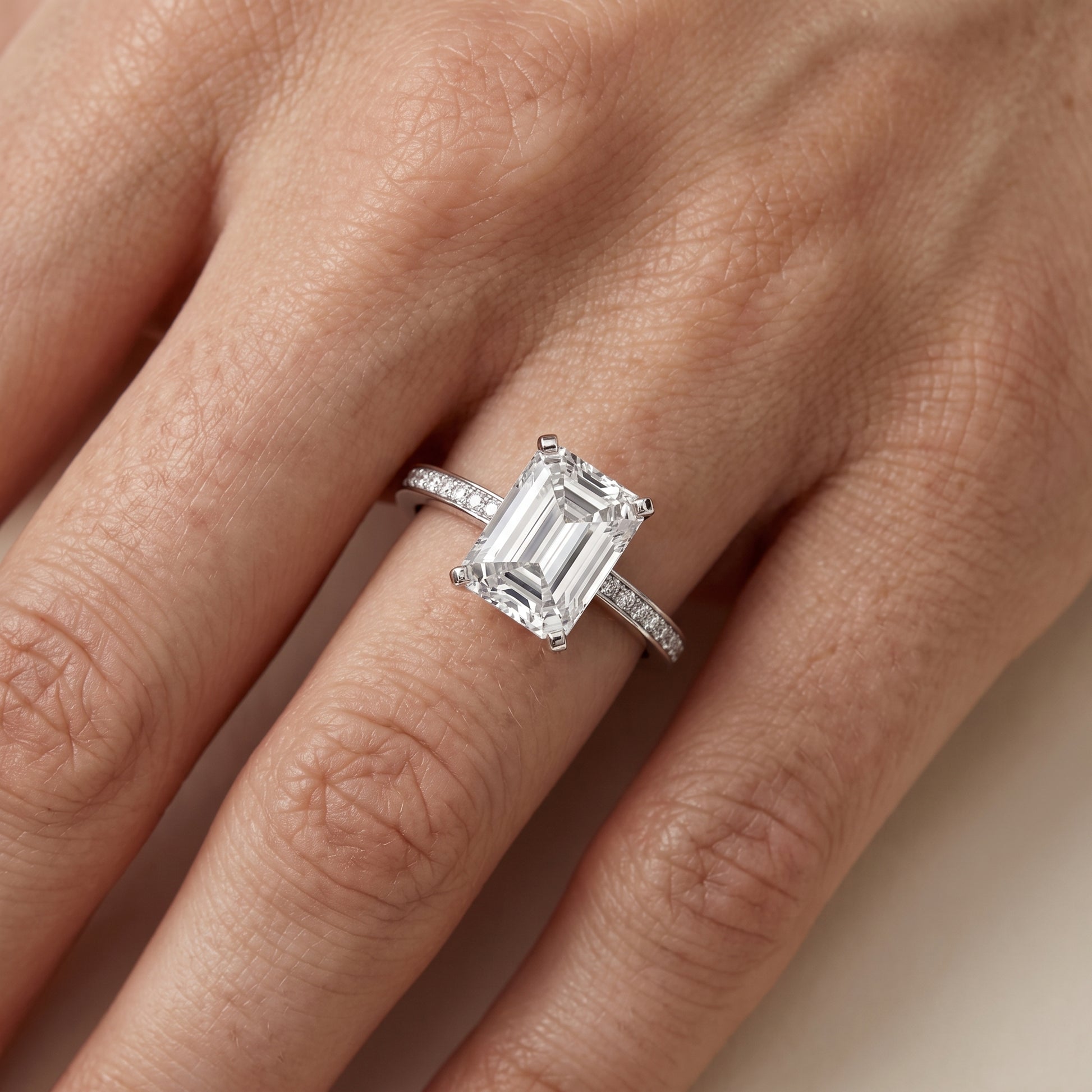 Naia Hidden Halo Emerald Diamond Ring in Platinum - lifestyle.jpg