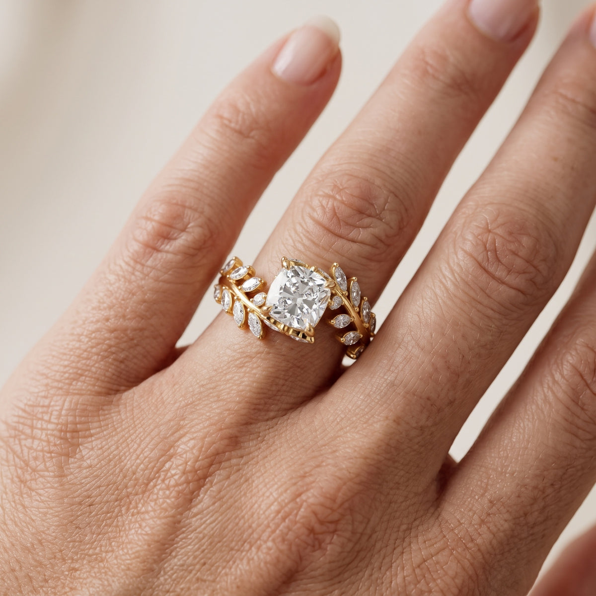 Clarion Leaf Bypass Cushion Diamond Engagement Ring in Yellow Gold - lifestyle.jpg