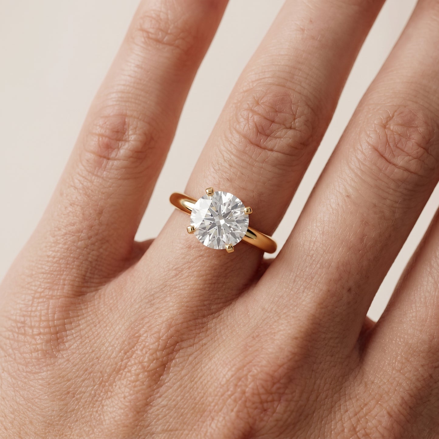 Wren Solitaire Round Diamond Ring in Yellow Gold - lifestyle.jpg