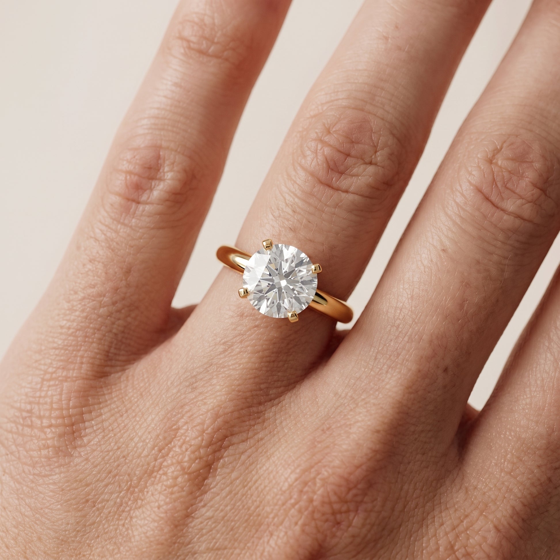 Wren Solitaire Round Diamond Ring in Yellow Gold - lifestyle.jpg
