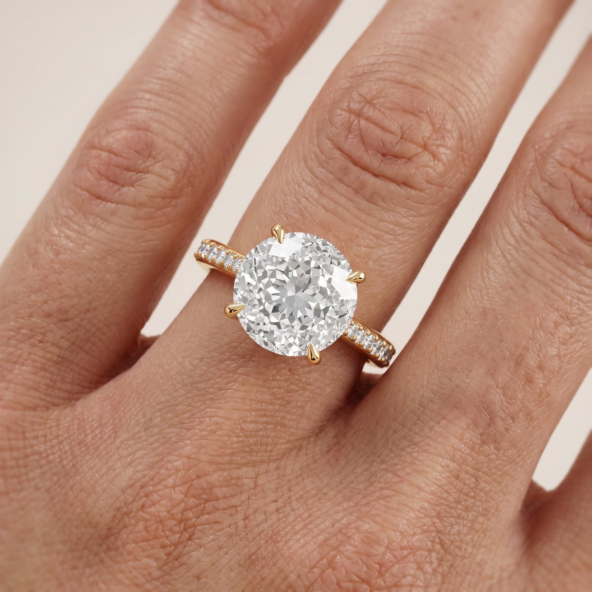 Skylar Twist Pavé Portuguese Cut Round Diamond Engagement Ring in Yellow Gold - lifestyle.jpg
