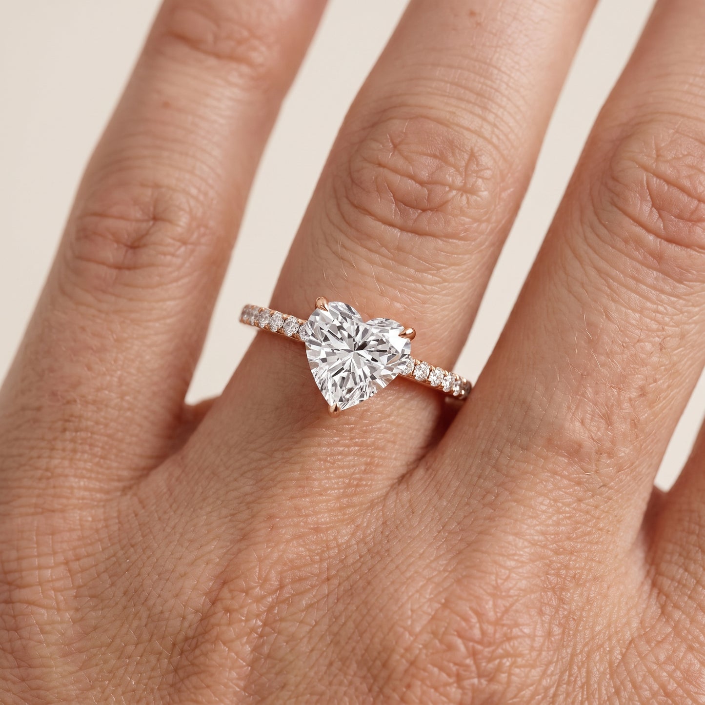 Ione Solitaire Pavé Heart Diamond Engagement Ring in Rose Gold - lifestyle.jpg