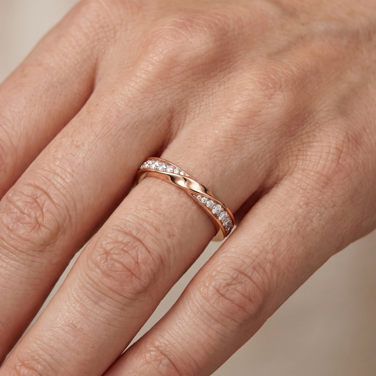 Sutton Twist Pavé Round Diamond Wedding Band in Rose Gold - lifestyle.jpg