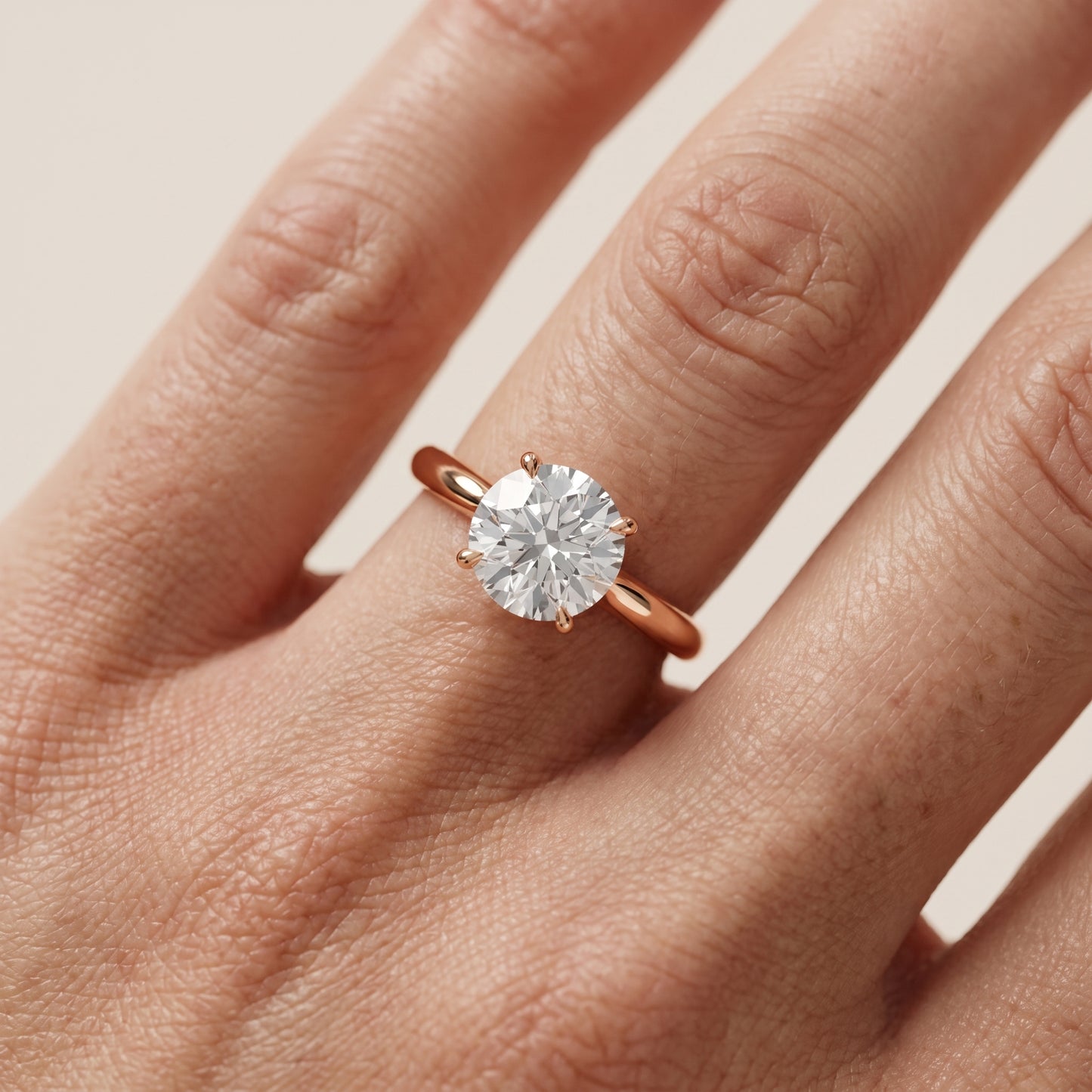 Kalia Knife Edge Solitaire Round Diamond Engagement Ring in Rose Gold - lifestyle.jpg