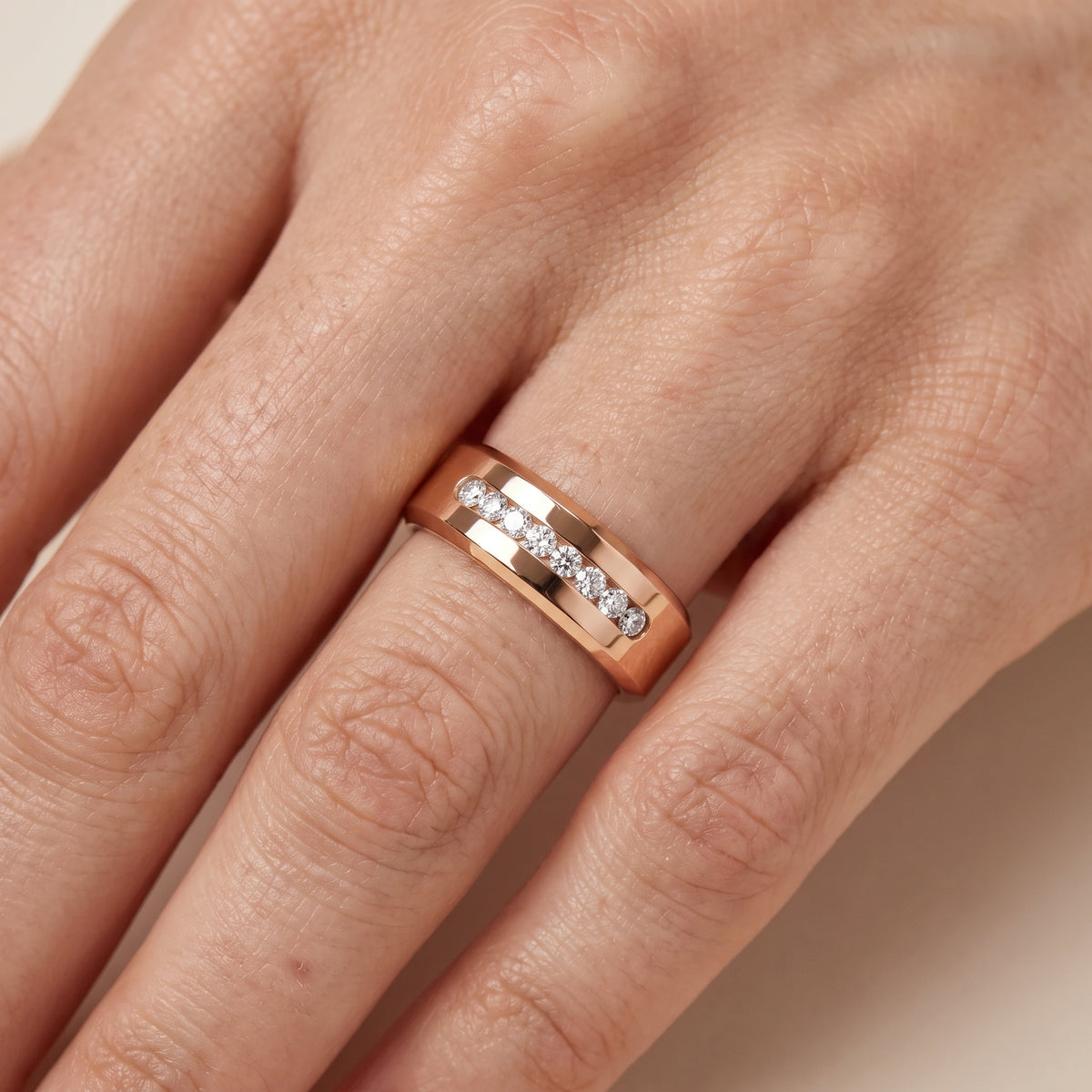 Portia Channel Set Round Diamond Wedding Band in Rose Gold - lifestyle.jpg