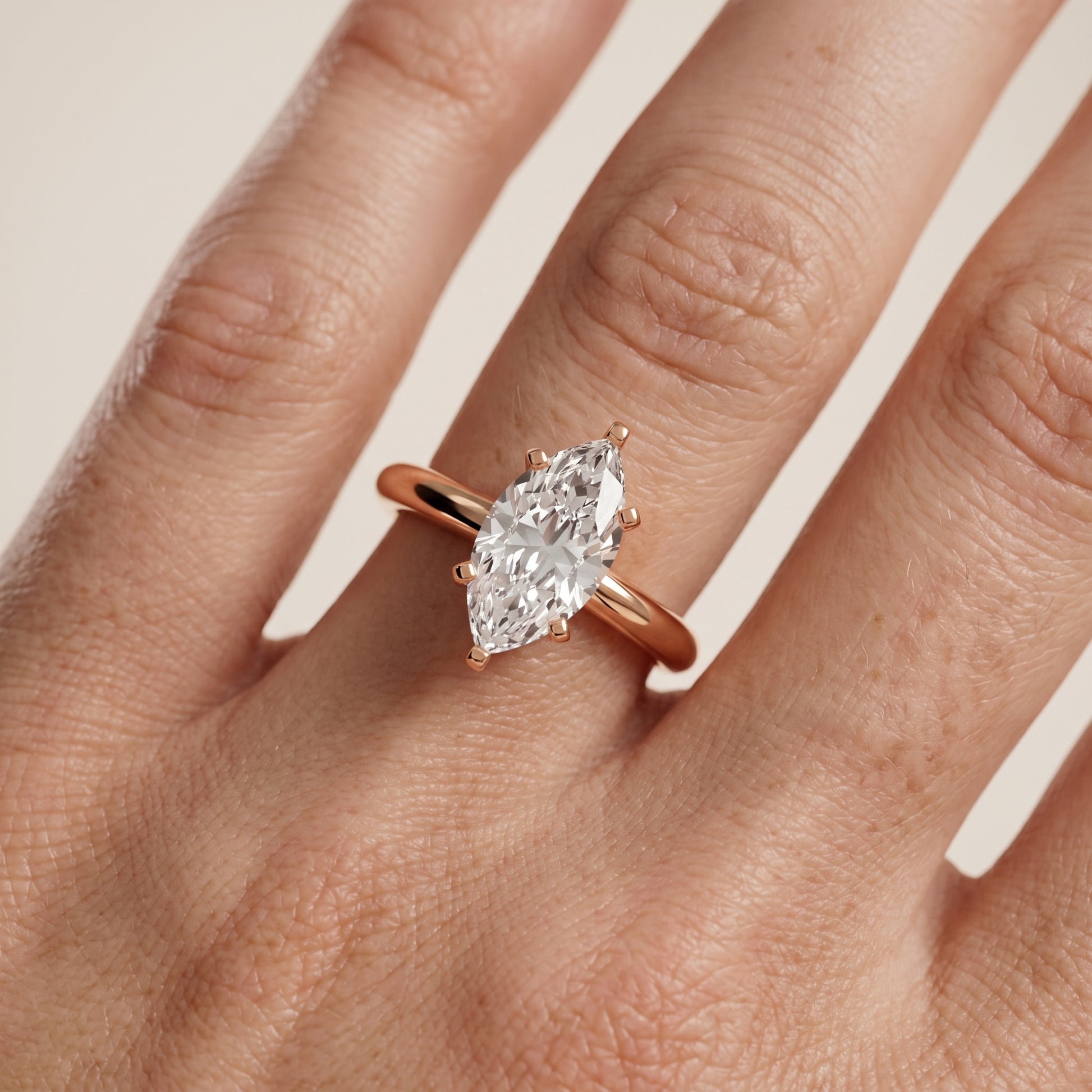 Wren Solitaire Marquise Diamond Ring in Rose Gold - lifestyle.jpg