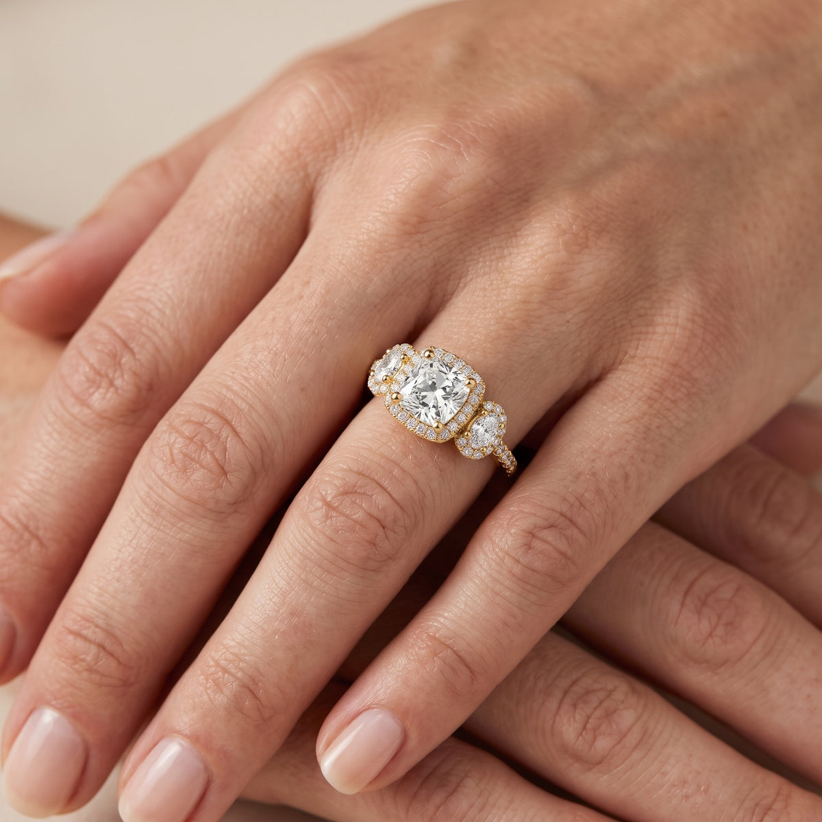 Austin Three-Stone Halo Cushion Diamond Engagement Ring in Platinum - lifestyle.jpg