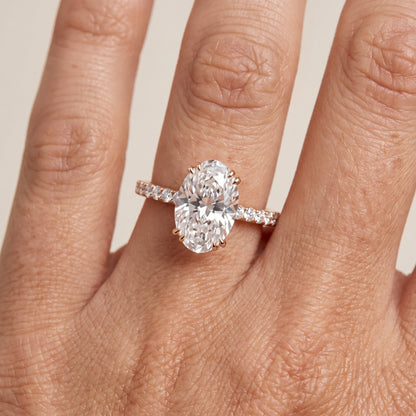 Novara Solitaire Pavé Oval Diamond Ring in Rose Gold - lifestyle.jpg