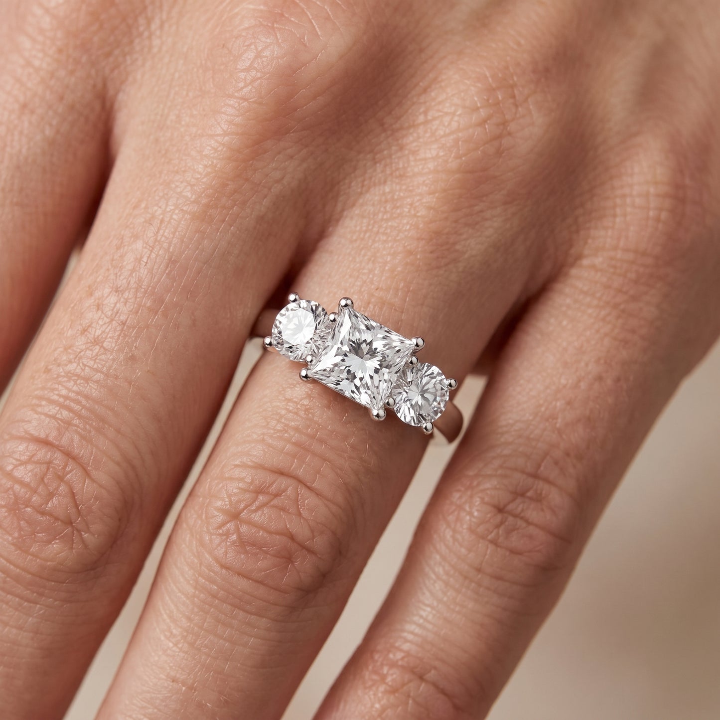 Callie Three-Stone Trellis Princess Diamond Engagement Ring in Platinum - lifestyle.jpg