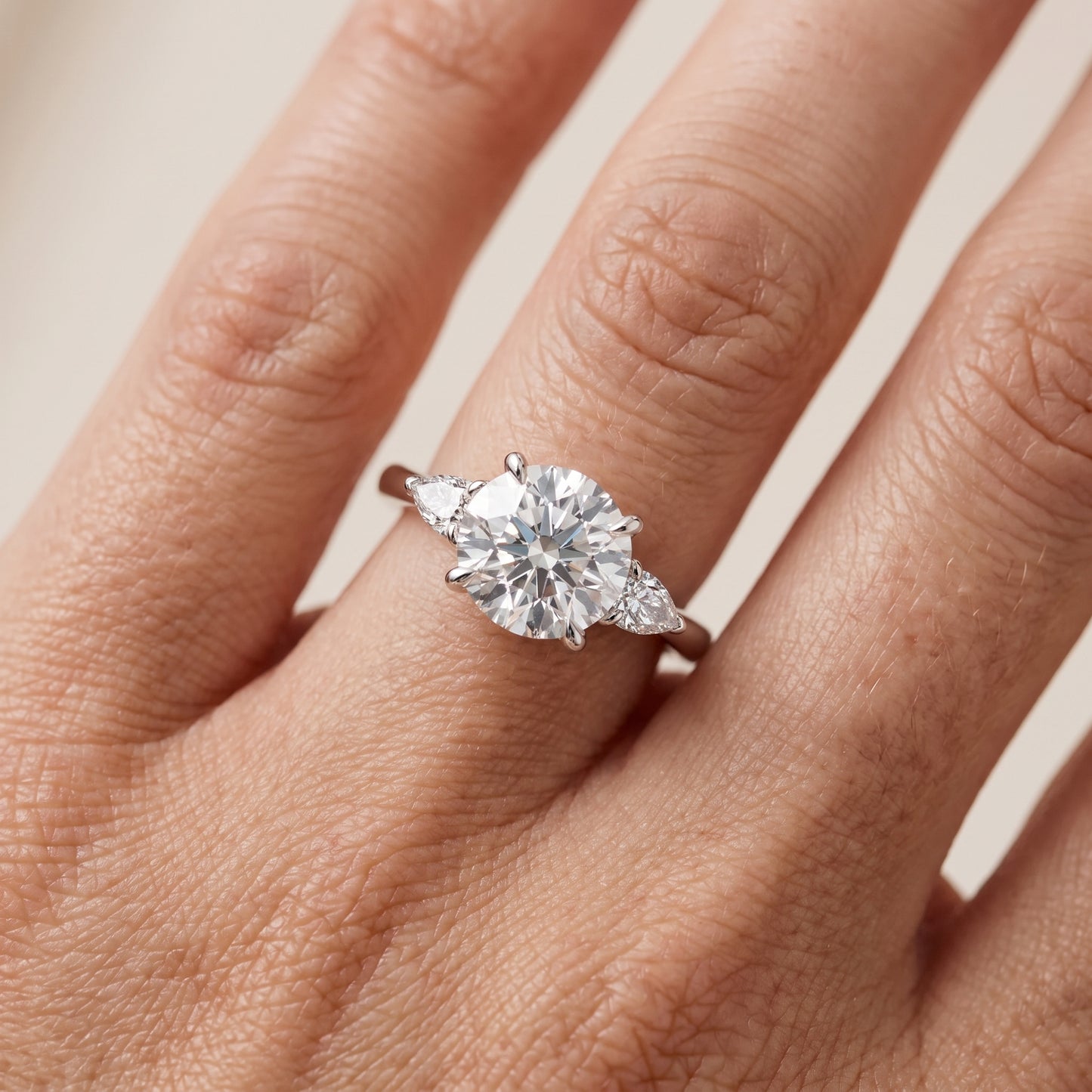 Leila Three-Stone Round Diamond Engagement Ring in White Gold - lifestyle.jpg