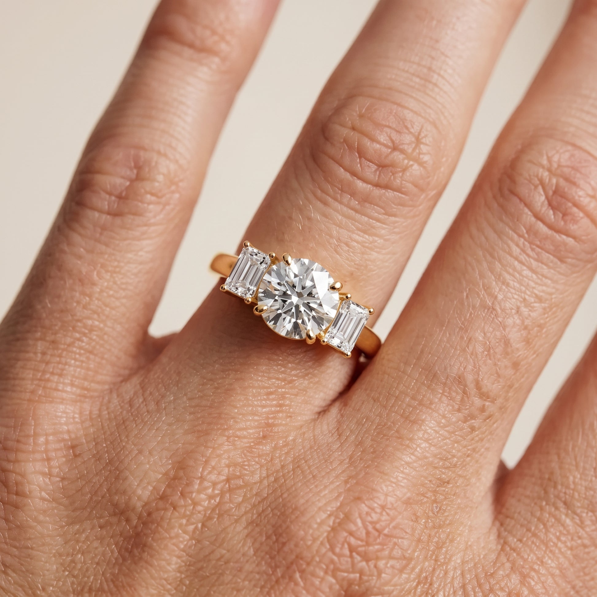 Zoe Three-Stone Round Diamond Ring in Yellow Gold - lifestyle.jpg