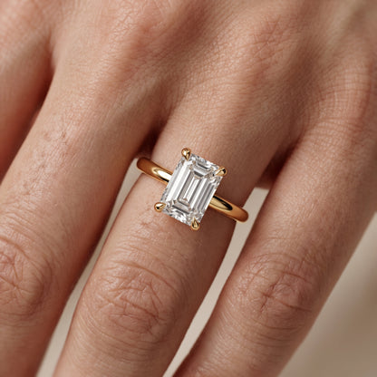 Nella Petite Solitaire Emerald Diamond Engagement Ring in Yellow Gold - lifestyle.jpg