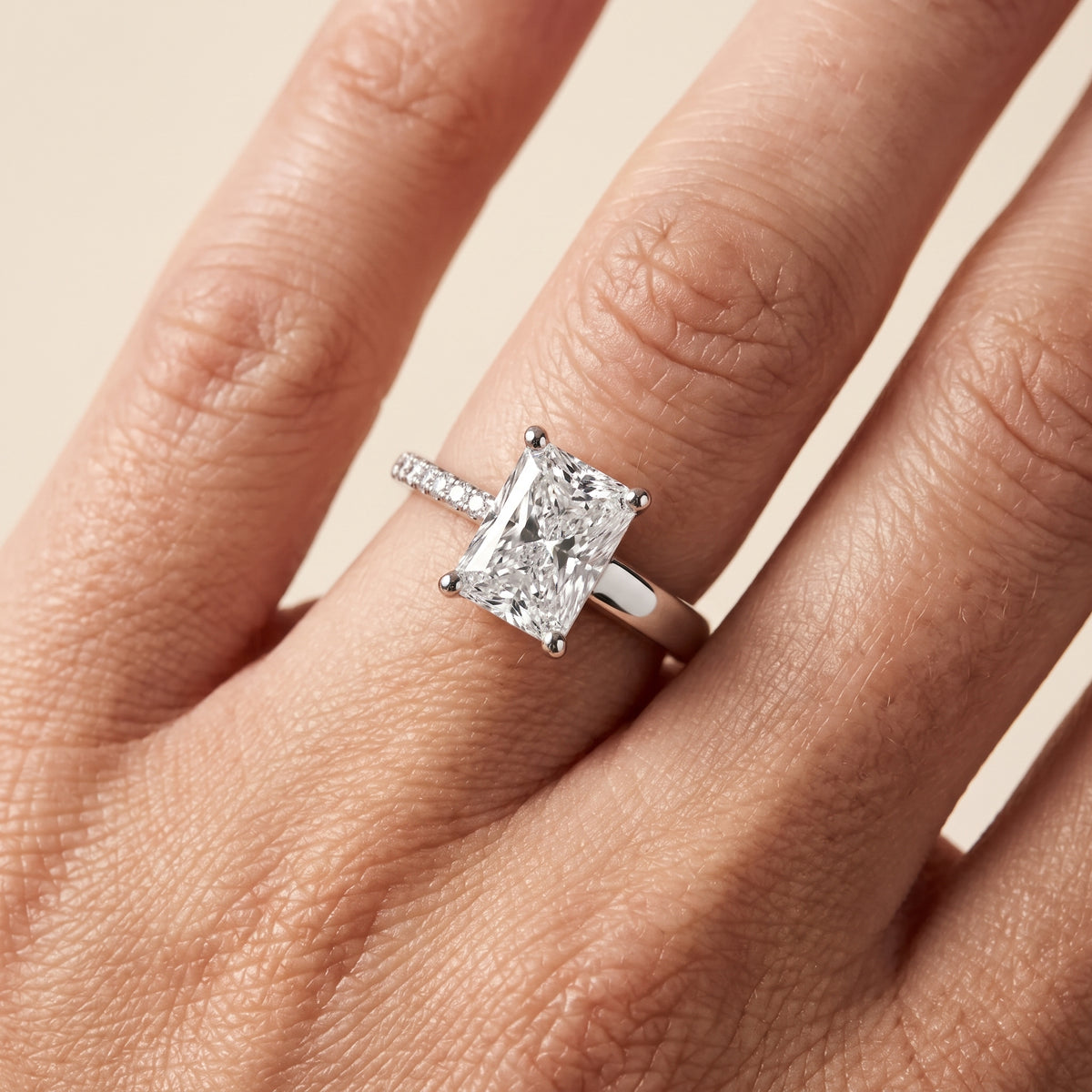 Rosie Solitaire Basket Radiant Diamond Engagement Ring in Platinum - lifestyle.jpg