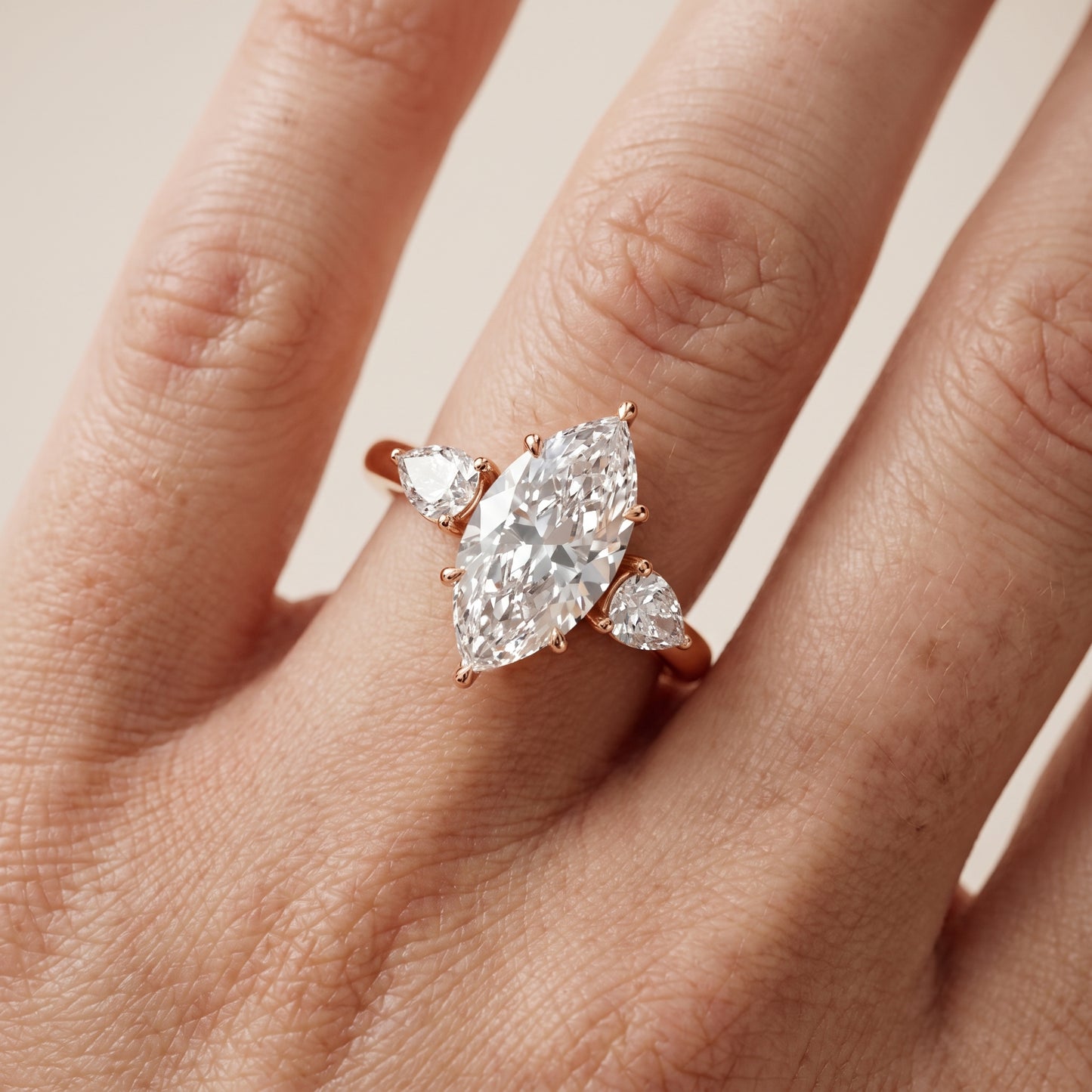 Phoebe Three-Stone Marquise Diamond Ring in Rose Gold - lifestyle.jpg