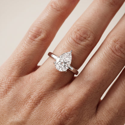 Liana Solitaire Claw Prong Pear Diamond Engagement Ring in Silver - lifestyle.jpg