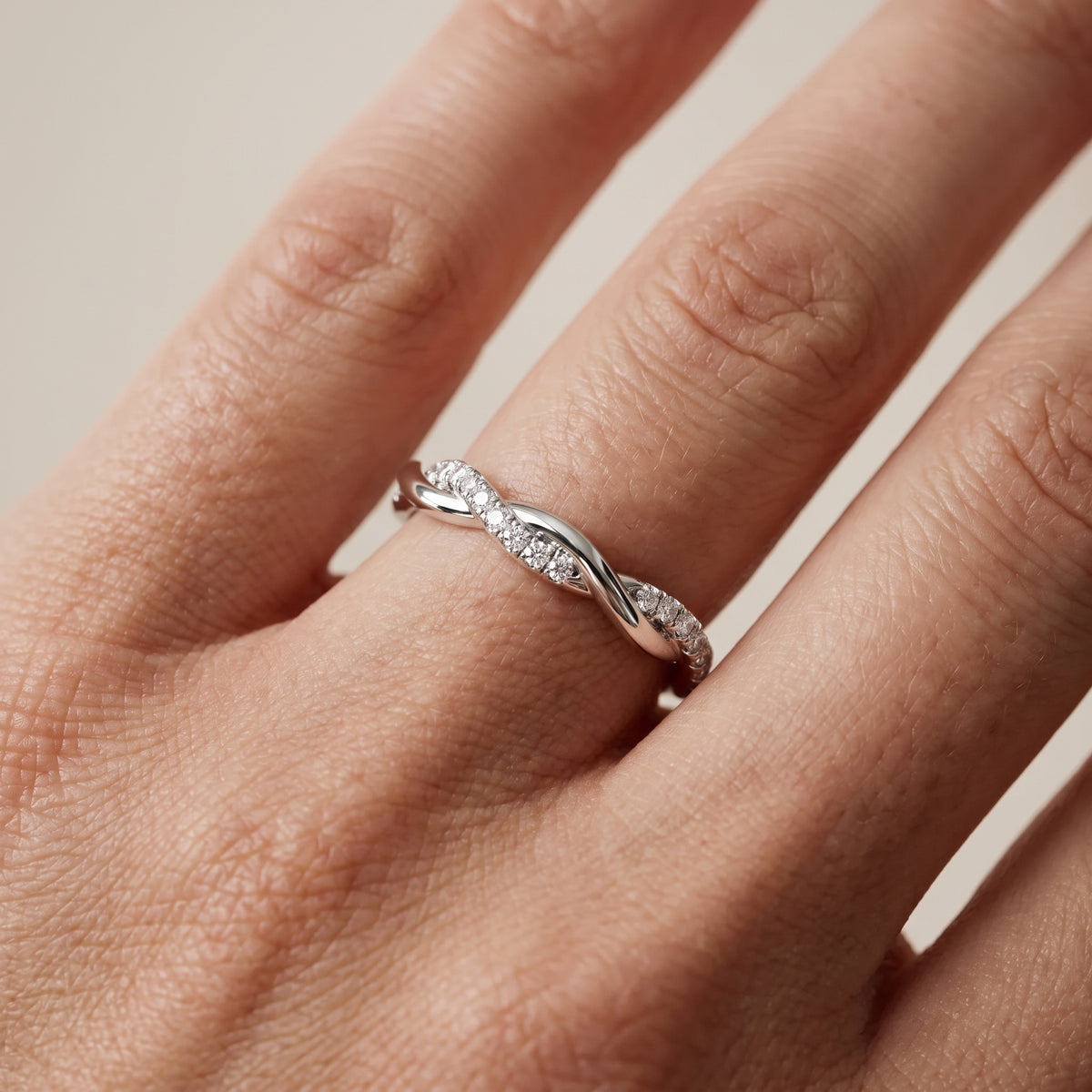 Emery Petite Twist Round Diamond Eternity Band in Silver - lifestyle.jpg