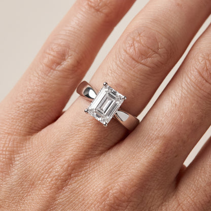 Talia Solitaire Twist Emerald Diamond Engagement Ring in Platinum - lifestyle.jpg