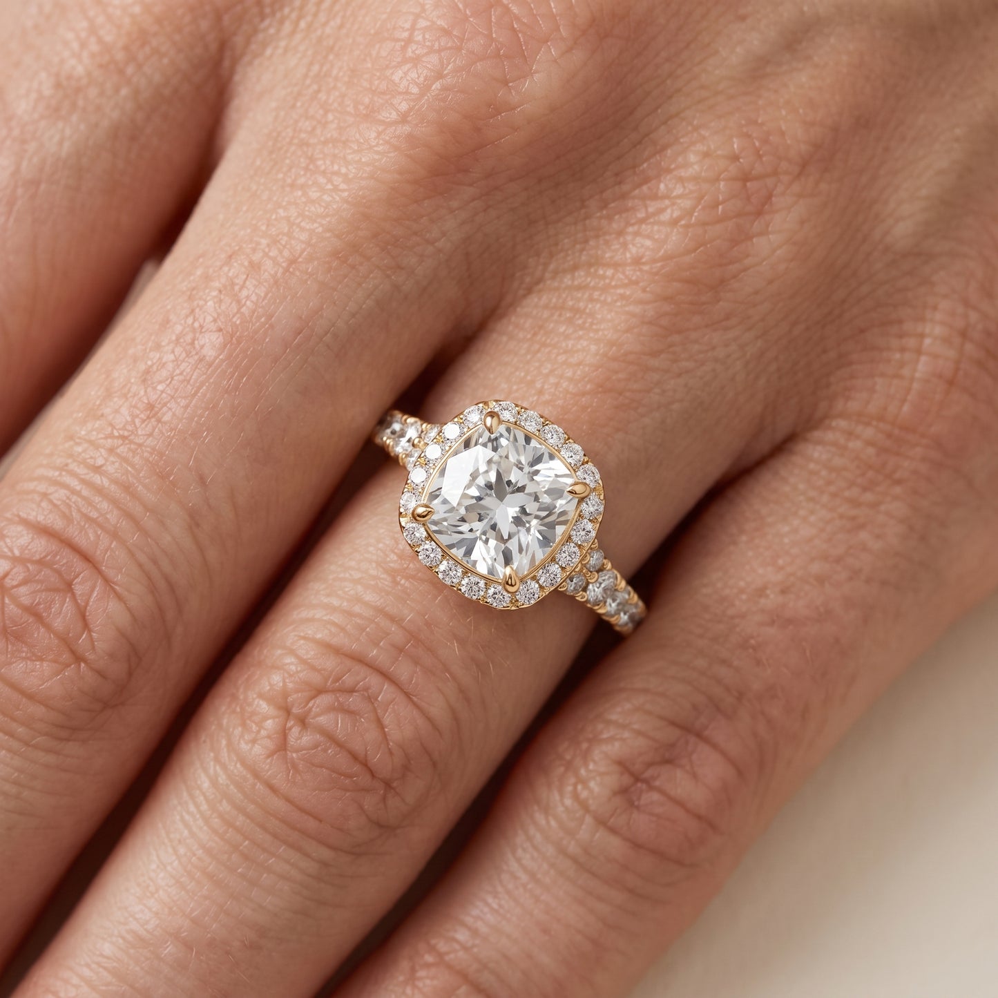 Bella Halo Pavé Cushion Diamond Engagement Ring in Yellow Gold - lifestyle.jpg